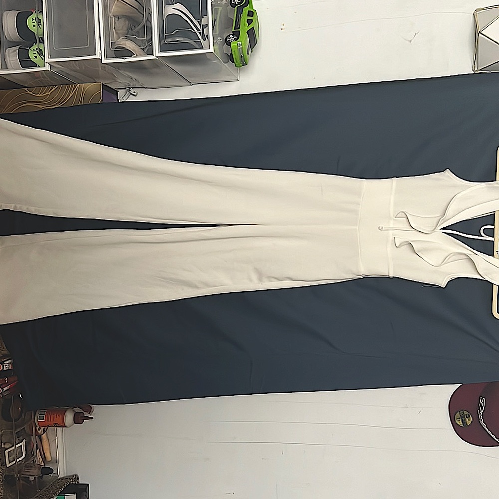 White jump suit worn a couple times no stains size small
